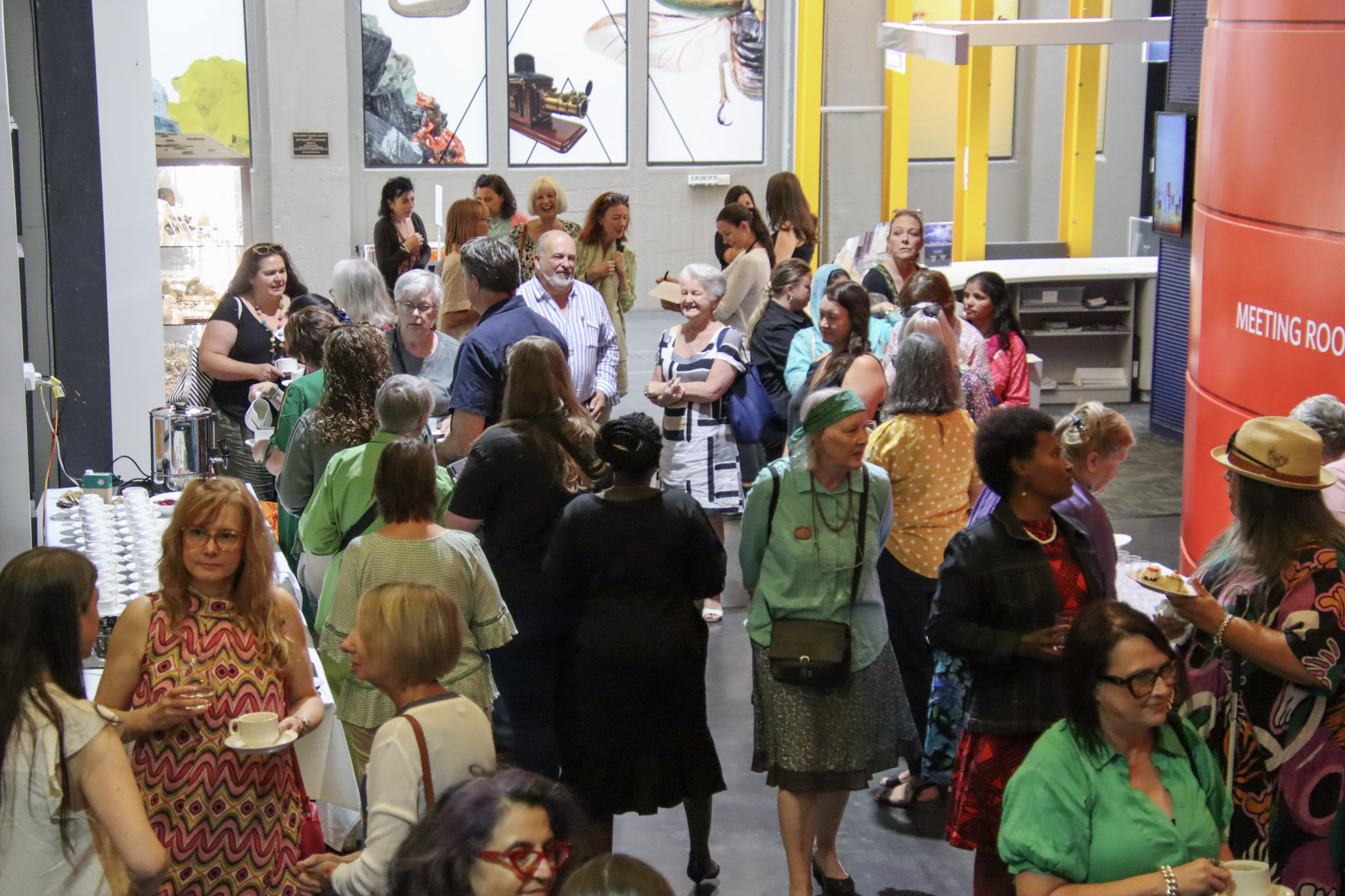 A crowd gathers at the QVMAG IWD24 morning tea